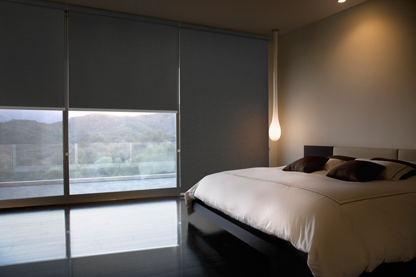 Blockout roller blinds in bedroom