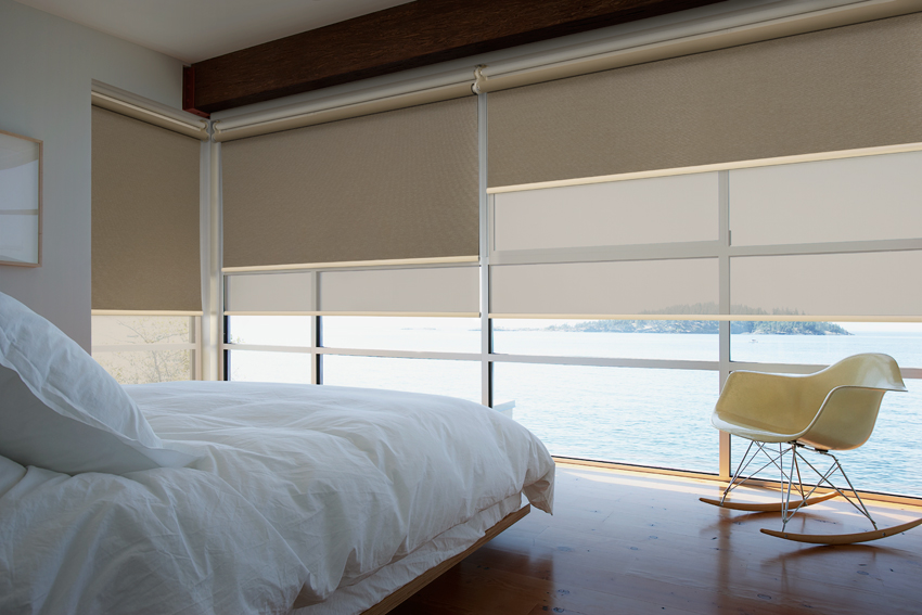 Roller blinds in a bedroom