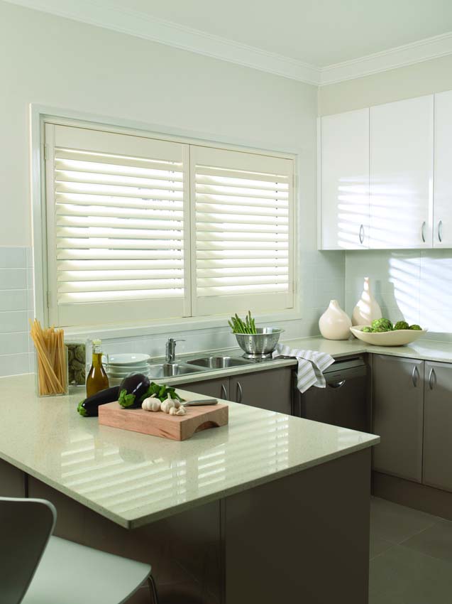 Timber shutters in a kitchen